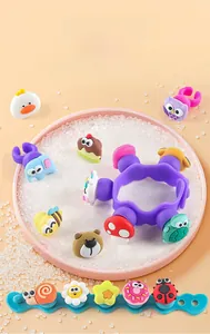 Kids DIY silicone bracelet set with colorful cartoon charms like ducks and owls