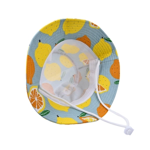 Kids light blue bucket hat with yellow lemon print and adjustable white chin strap