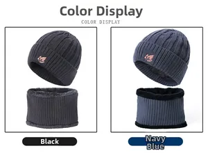 Detail of winter knit beanie and neck warmer set with warm plush lining in black and navy