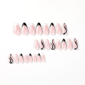 Faux ongles French avec lignes ondulées noires et blanches de forme amande