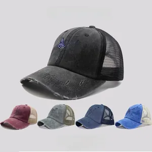 Detail of distressed baseball cap with butterfly flag embroidery and mesh back panels