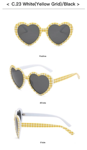 Three-view display of heart-shaped sunglasses with yellow and white checkered frames