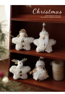 Set of four plush white Christmas ornaments featuring Santa, reindeer, and angel figurines