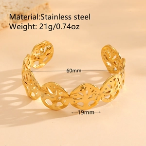 Golden stainless steel tree of life cutout cuff bracelet with an irregular vintage design
