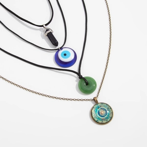 Detailed set of 4 ethnic style necklaces with evil eye and geometric stone pendants