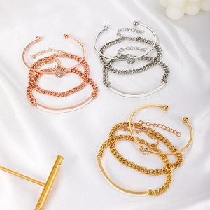 Punk style 4-piece geometric bracelet set featuring gold cubic zirconia bangles for women