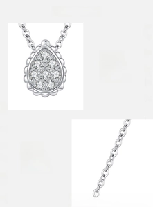 Macro shot of 925 sterling silver water drop pendant with paved 5A cubic zirconia crystals