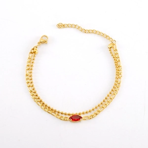 Double-layered gold titanium steel bracelet with marquise-cut red zircon accent