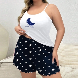 Women's pajama set featuring white moon print tank top and blue star ruffle shorts