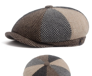 Detail of vintage herringbone patchwork newsboy cap with textured wool blend fabric