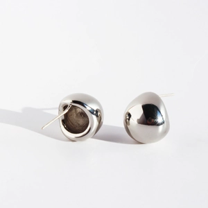 Polished silver teardrop earrings with a minimalist geometric water drop design