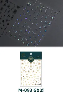 Macro detail of M-093 gold nail stickers featuring celestial stars and moon patterns