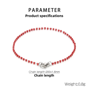 Detail view of red enamel cylinder link chain with lobster clasp and length measurement