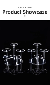 Multi-tier clear acrylic display stand with circular tiered pedestals for jewelry