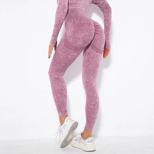 Detail showing the acid wash texture and peach lift design on seamless yoga leggings