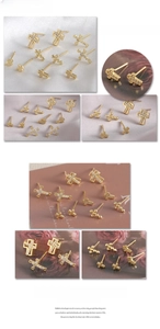 Macro detail of various 18K gold plated cross earrings with micro-set zircon stones