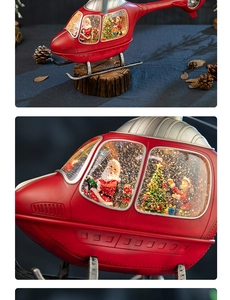 Detailed view of red helicopter snow globe with Santa Claus and a Christmas tree inside