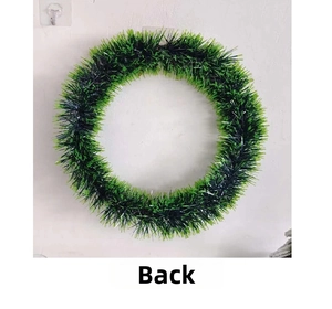 Detail showing the sturdy back structure of the Christmas wreath with green and blue tinsel