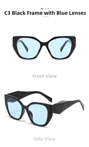Detail view of cat eye sunglasses with thick black frames and light blue tinted lenses