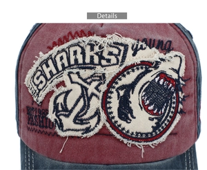 Close-up of vintage cotton baseball cap with 3D shark embroidery and distressed details