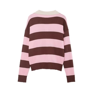 Detailed view of pink and brown striped knit sweater with drop shoulder design