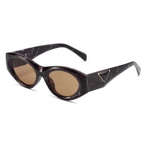 Retro cat-eye oval sunglasses with purple marble texture frame and brown tinted lenses