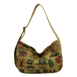 Retro mustard yellow canvas tote bag with vintage prints and adjustable strap for women