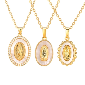 Golden oval pendant necklace with Virgin Mary shell inlay and sparkling rhinestones