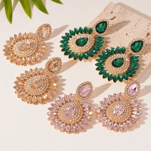Luxury rhinestone drop flower earrings in champagne gold, emerald, and pink hues