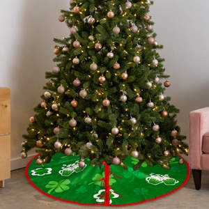 Detail of green St. Patrick's Day tree skirt with clover prints and red ties