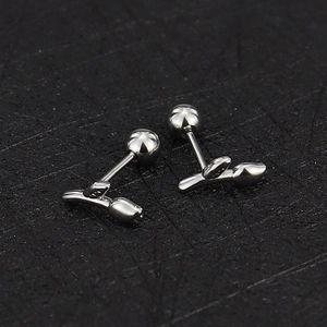 Macro shot of silver tulip stud earrings with screw-on ball back in 16g stainless steel