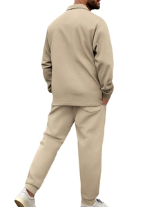 Detail of light beige corduroy texture on men's slim casual jacket and matching pants