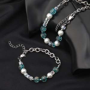 Collier couple en acier inoxydable avec perles en verre bleu et perles blanches