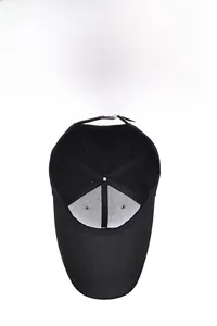 Detail view of black baseball cap interior with breathable mesh and metal adjustment buckle