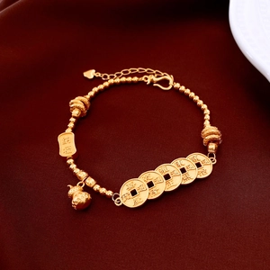 Detail of 24K gold plated bracelet with Five Emperor coins, gourd pendant and lucky tag