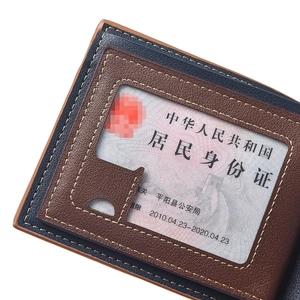 Detail view of leather men's wallet with multiple card slots and yellow stitching