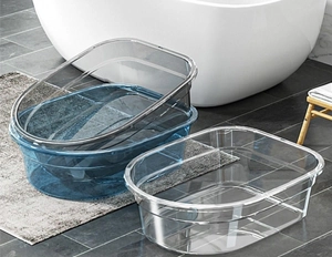 Detail showing stackable thick plastic basins in transparent, blue and gray colors