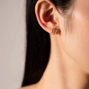 Elegant S925 sterling silver gold fringe stud earring with diamonds on a female model