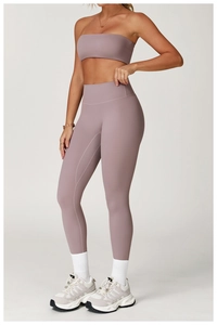 Close-up of lavender high-waisted yoga leggings and sports bra set in matte fabric