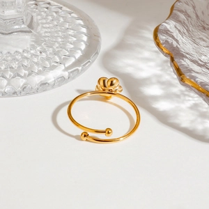 Elegant 18k gold plated stainless steel flower ring with adjustable open band design