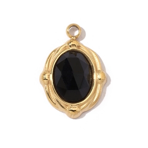 Pendentif étoile bohème avec pierre noire ovale et monture en acier inoxydable doré