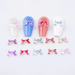 Bijoux à ongles en forme de nœud métallique 3D en émail coloré pour décoration DIY