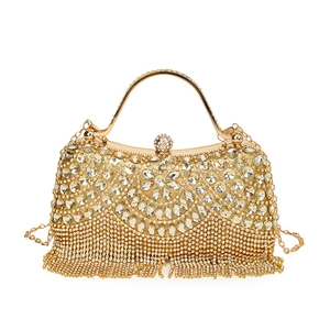 Luxurious gold rhinestone evening clutch bag with fringe tassels and chain strap