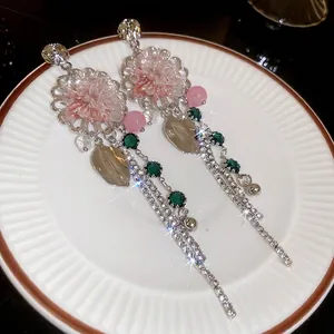 Elegant princess floral tassel earrings with clear crystals and long rhinestone fringes