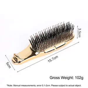 Detailed view of golden electroplated scalp massage comb with dimensions 15.7x5x3.5cm