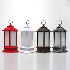 Row of vintage LED Christmas lanterns in red, white, bronze and silver grey finishes