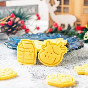 Japanese style DIY Christmas cookie cutters featuring milk carton and cute cow shapes