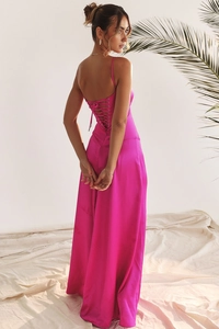 Detail view of criss-cross back straps on a magenta satin long dress for evening wear