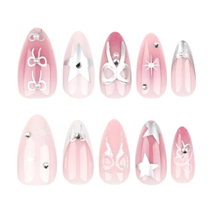Pink French almond press-on nails with silver stars, bows and pearl rhinestones