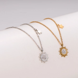 Elegant 18k gold and silver sunflower necklaces with star charms and sparkling crystals